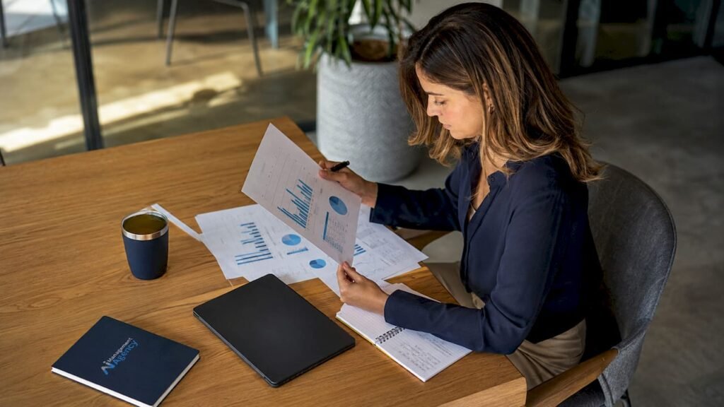 Professional reviewing AI receptionist performance data