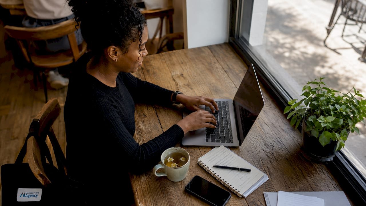 Small business owner setting up virtual receptionist